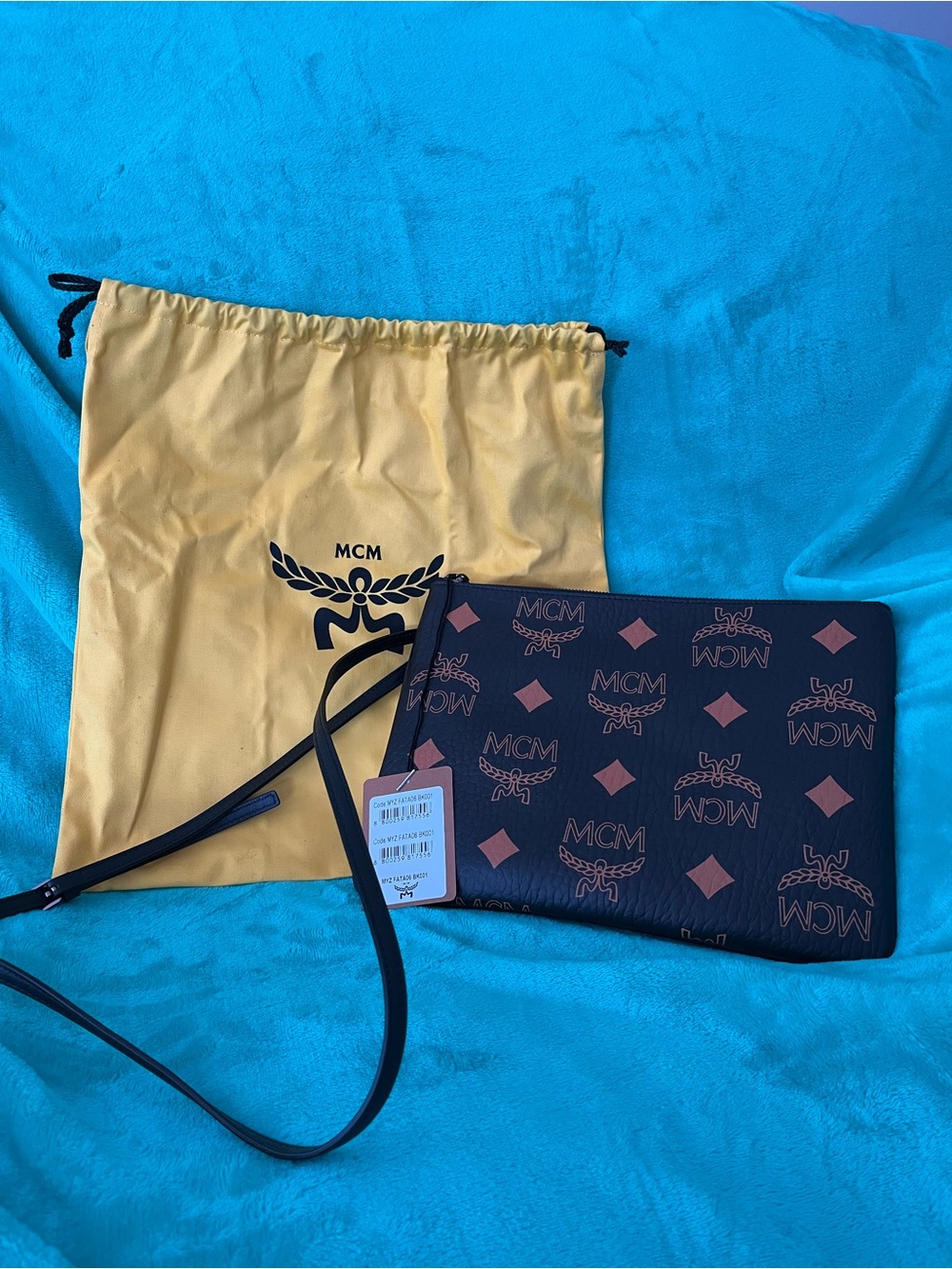 NWT authentic MCM Black and Cognac Aren Crossbody Pouch with Monogram Print